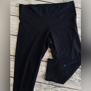 Champion active wear spandex leggings, yoga pants. Below the knee length.